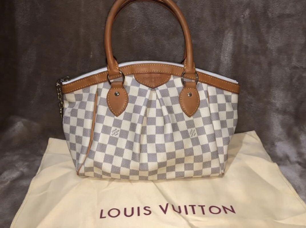 Louis Vuitton 2012 Monogram Tivoli Handbag · INTO