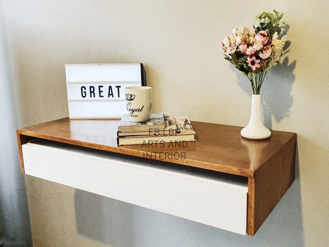 Sale! Study Table / Work Desk (Category: Tables & Sets) located in Paranaque City. Submitted by chc_mnl (Listing ID 1014238319, Image 3). Description: On Sale! Space saver work desk / study table dual purpose - drawer and keyboard desk Floating table design Dimensions : W 90cm x H 17cm x D 40cm Three colors #1 All white #2 White top, wood finish drawer #3 Wood finish top, white drawer High quality, Built to last Sturdy and durable built solid Duc