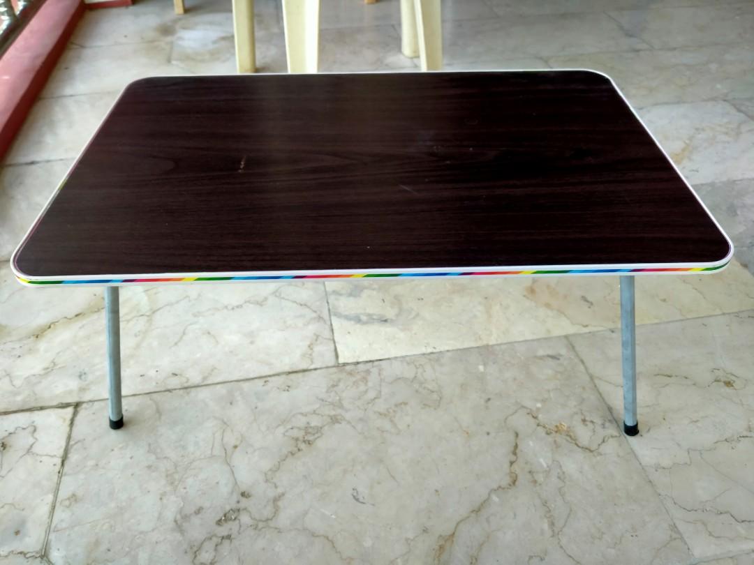 Study Table (Category: Tables & Sets) located in Balayan. Submitted by cedtechnologies (Listing ID 1014226394, Image 1). Description: I am selling this mini study table that I bought last year. I don't use it anymore and is just lying around our house. Pick up in Balayan, Batangas. Specs: Width 15.5 in. Lemgth 23.5 in. Height: 10.25 in. Wood Grain Laminated Top.