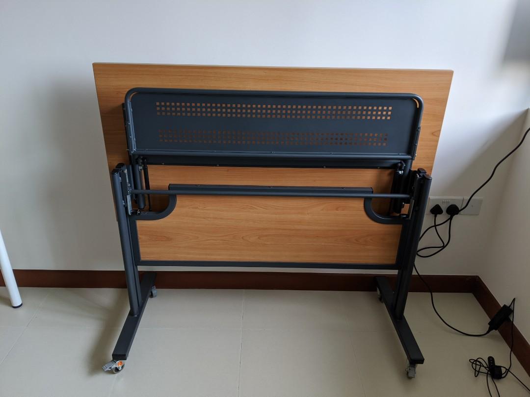 Work Desk (Category: Tables & Sets) located in Singapore. Submitted by wooppee (Listing ID 1014237191, Image 3). Description: Good quality table - foldable as seen in the 3rd photo. Self collect. Dimensions: 120cm x 60cm.