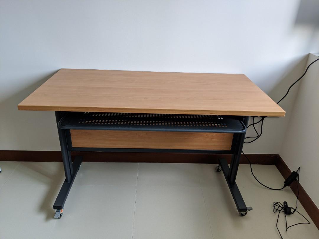 Work Desk (Category: Tables & Sets) located in Singapore. Submitted by wooppee (Listing ID 1014237191, Image 1). Description: Good quality table - foldable as seen in the 3rd photo. Self collect. Dimensions: 120cm x 60cm.