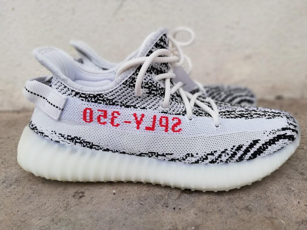 Yeezy zebra harga new arrivals