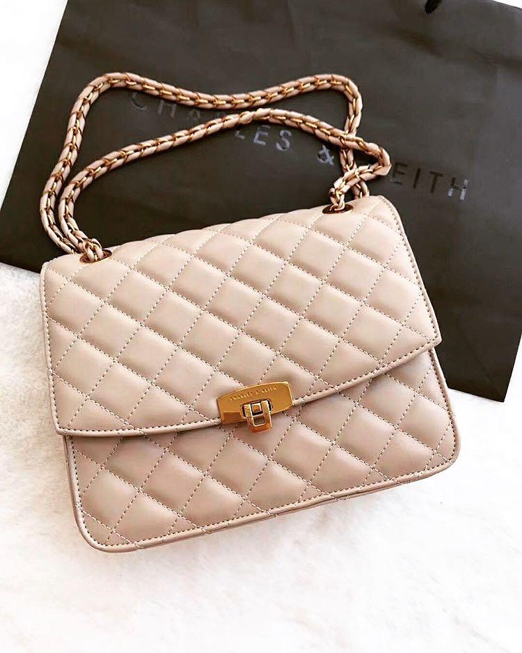 Sale Charles And Keith Quilted Push Lock Bag Women S Fashion Bags Wallets Sling Bags On Carousell