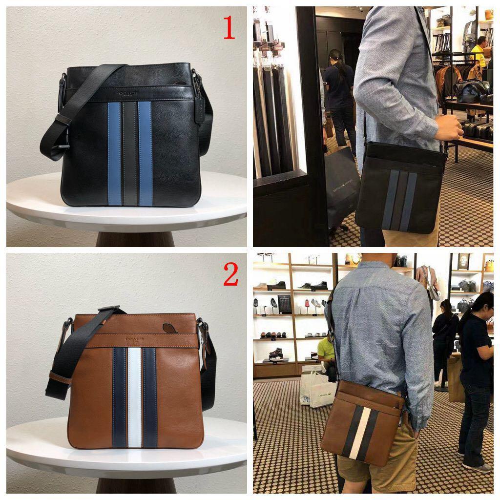 coach charles crossbody with varsity stripe
