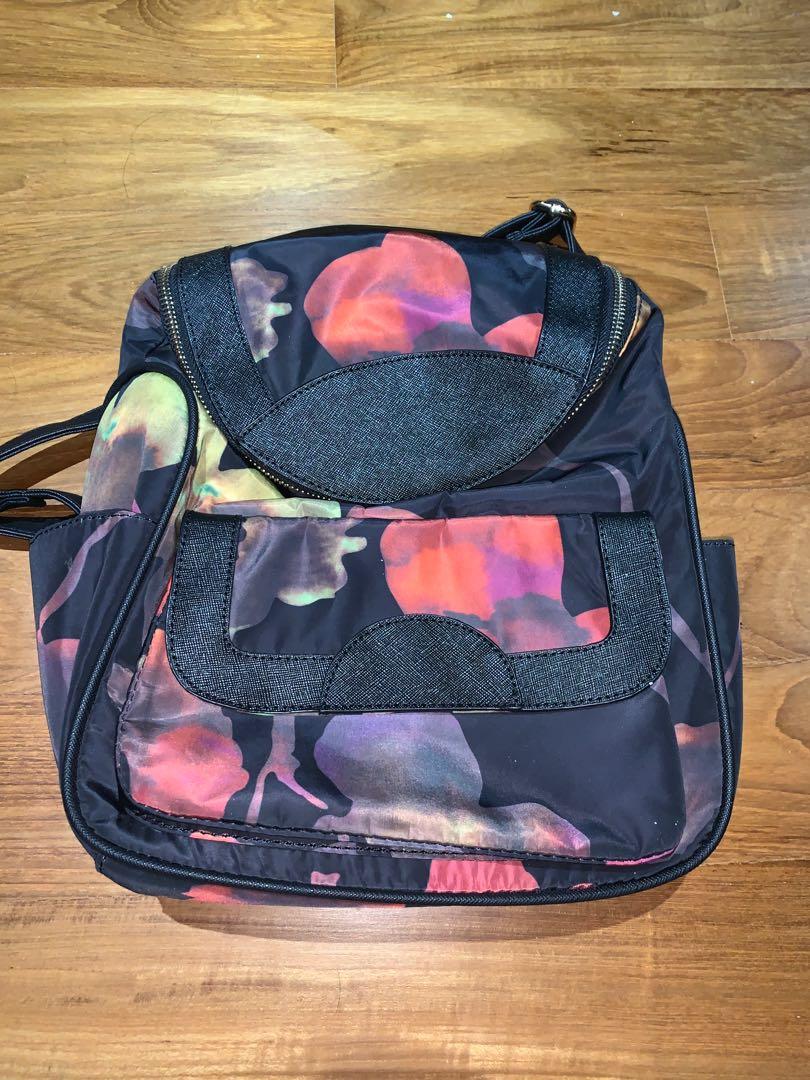 sling backpack designer