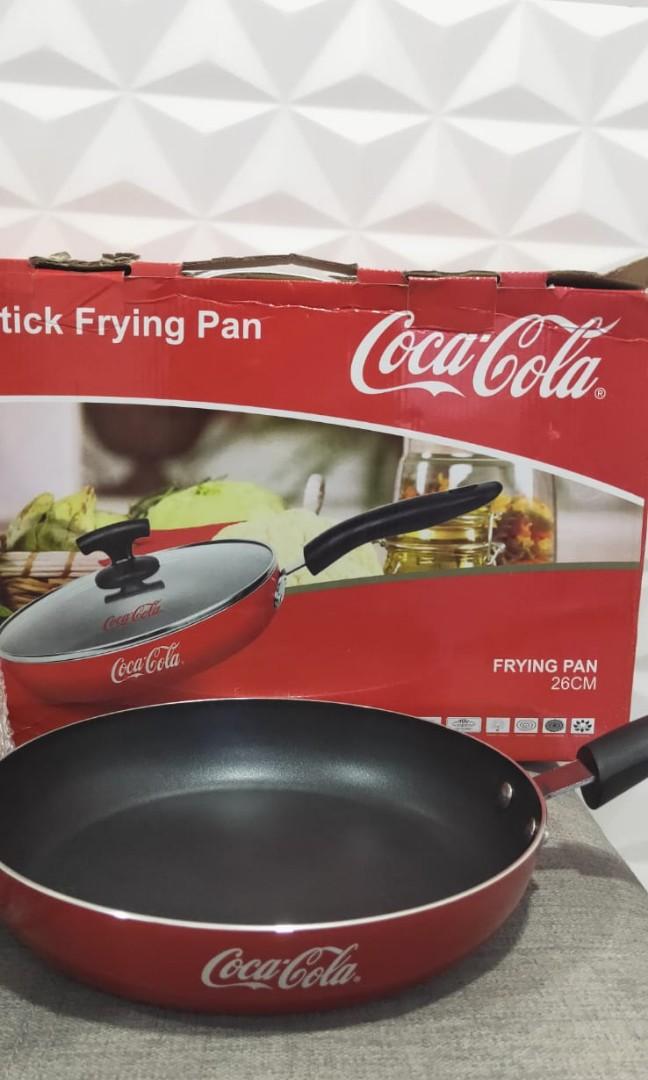 Frying Pan (Category: Cookware & Accessories) located in Singapore. Submitted by NOWATCH (Listing ID 1014495066, Image 1). Description: •Unique collectable item for Coca Cola lovers. •26cm non stick frying pan. •Brand new and come with box.