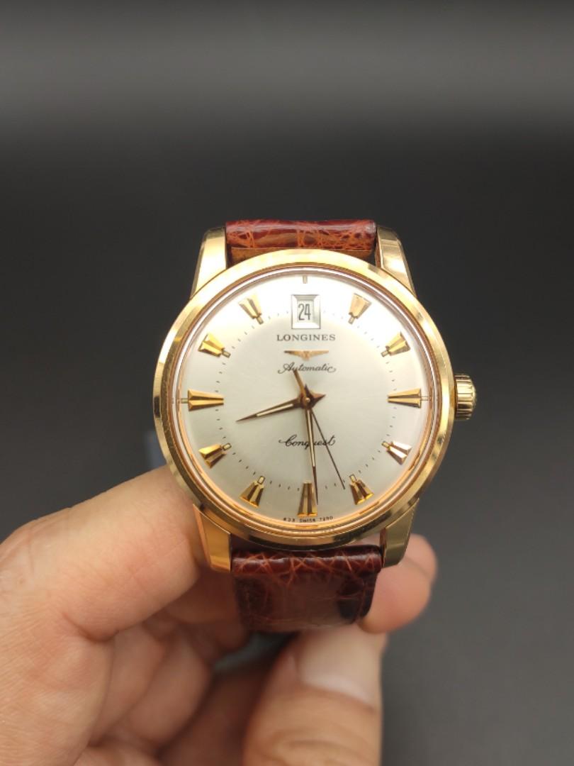 Longines best sale conquest 18k