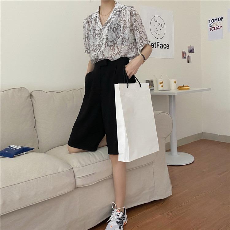 PYTHON Print Chiffon Open Front Top (Category: Blouses) located in Singapore. Submitted by vforvanity (Listing ID 1014508577, Image 2). Description: Brand new unworn in bag, no tagged size. Measures approx 55cm across PTP, 65cm long, shoulders 43cm across. Fits UK6 as seen on model, UK8 UK10 comfortable, UK12 fitted. Material // Chiffon Polyester Colour // Grey python snake print Stretch // No No trades, normal postage is free of charge. FREE QXP