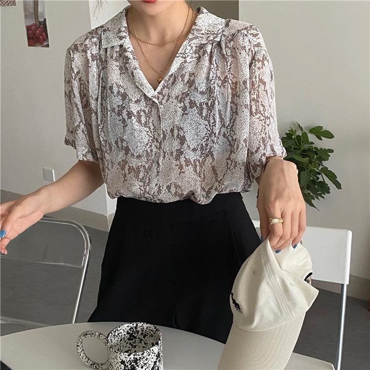 PYTHON Print Chiffon Open Front Top (Category: Blouses) located in Singapore. Submitted by vforvanity (Listing ID 1014508577, Image 1). Description: Brand new unworn in bag, no tagged size. Measures approx 55cm across PTP, 65cm long, shoulders 43cm across. Fits UK6 as seen on model, UK8 UK10 comfortable, UK12 fitted. Material // Chiffon Polyester Colour // Grey python snake print Stretch // No No trades, normal postage is free of charge. FREE QXP