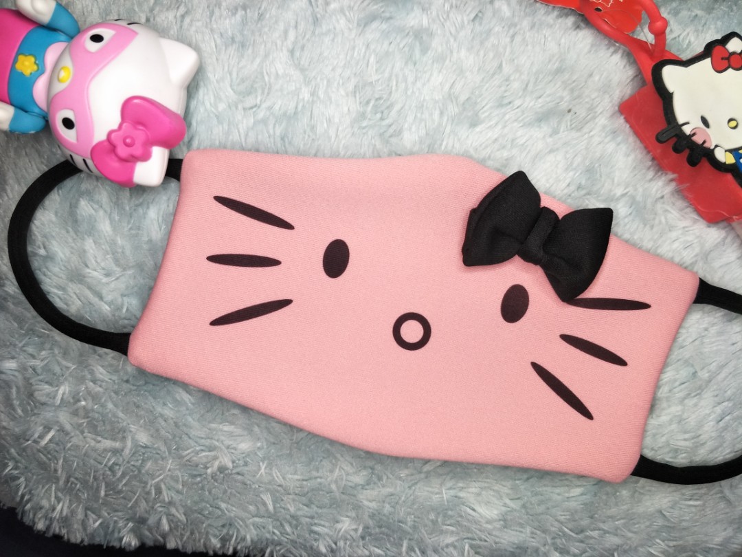 Washable hello kitty face mask, Women's Fashion, Watches & Accessories