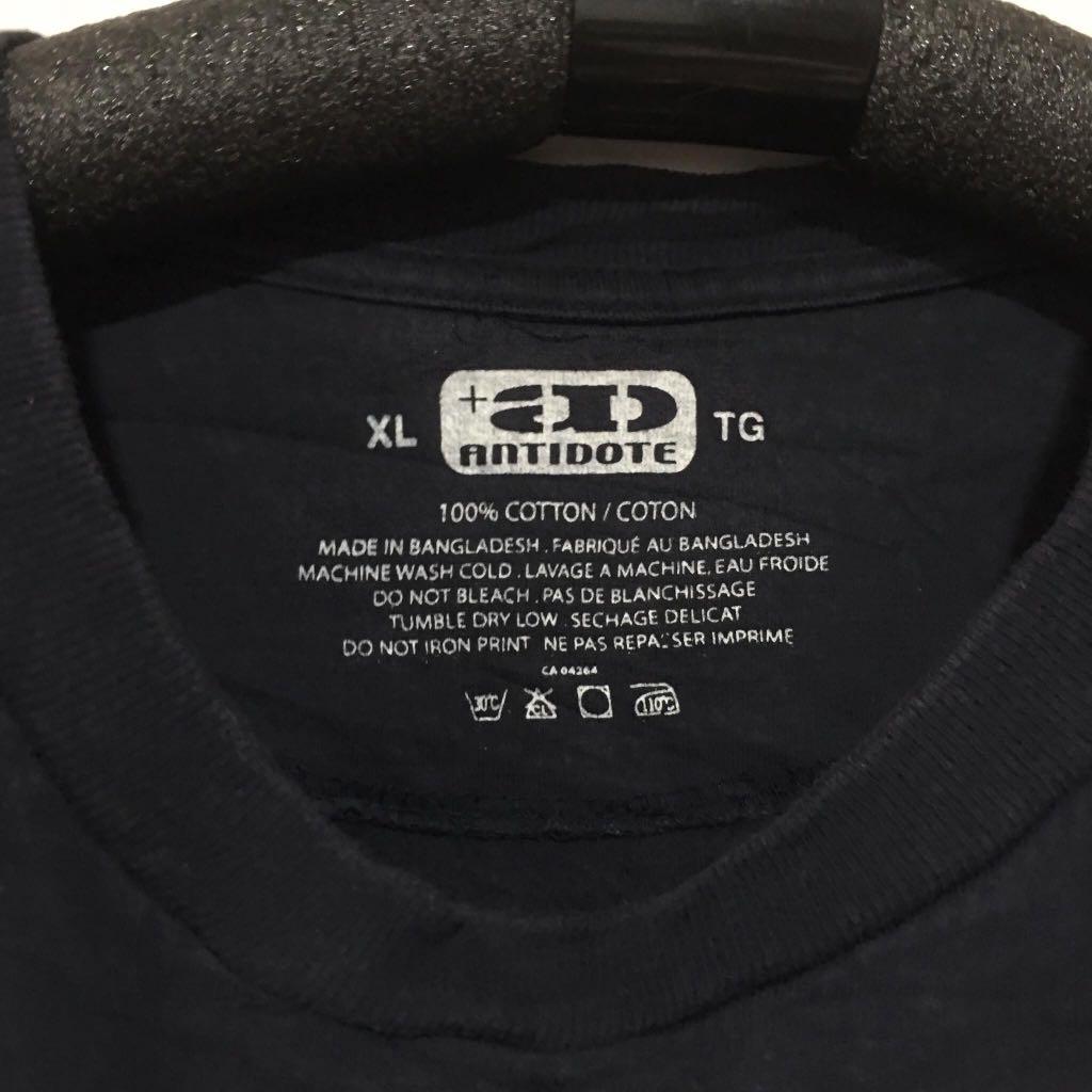 Antidote Graphic Shirt (Category: Tshirts & Polo Shirts ) located in Quezon City. Submitted by emporium.vtg (Listing ID 1010674277, Image 2). Description: Antidote Shirt . Size XL Length: 29.5” Width: 26” Issue: holes on the bottom.