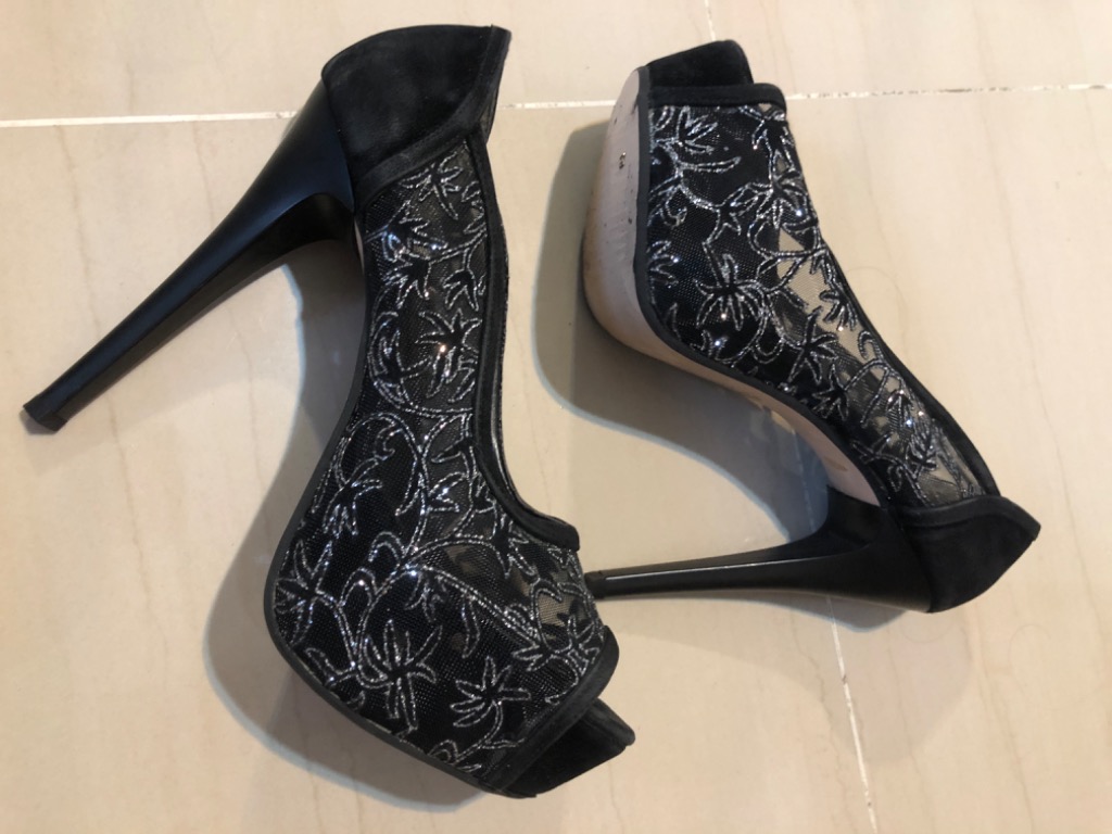 Black and silver platform heels