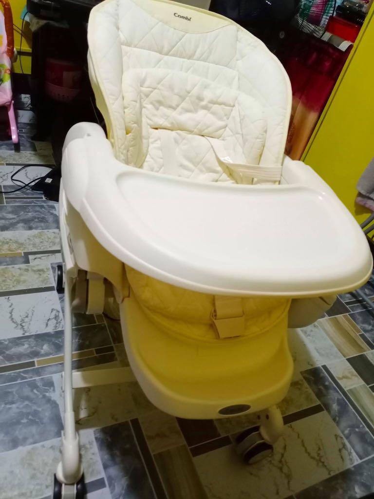 combi auto swing high chair