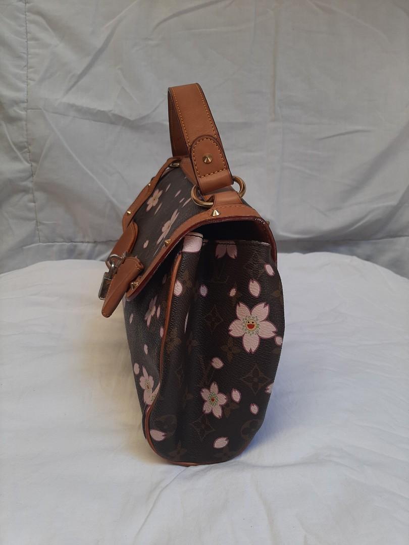 Authentic Cherry Blossom LV limited edition (Category: Luxury Bags & Wallets) located in Bacoor. Submitted by thinecolla2891.1 (Listing ID 1014800136, Image 2). Description: with serial code.. the only flaws is ung sa lock nya po natahi na. complete with padlock and key...