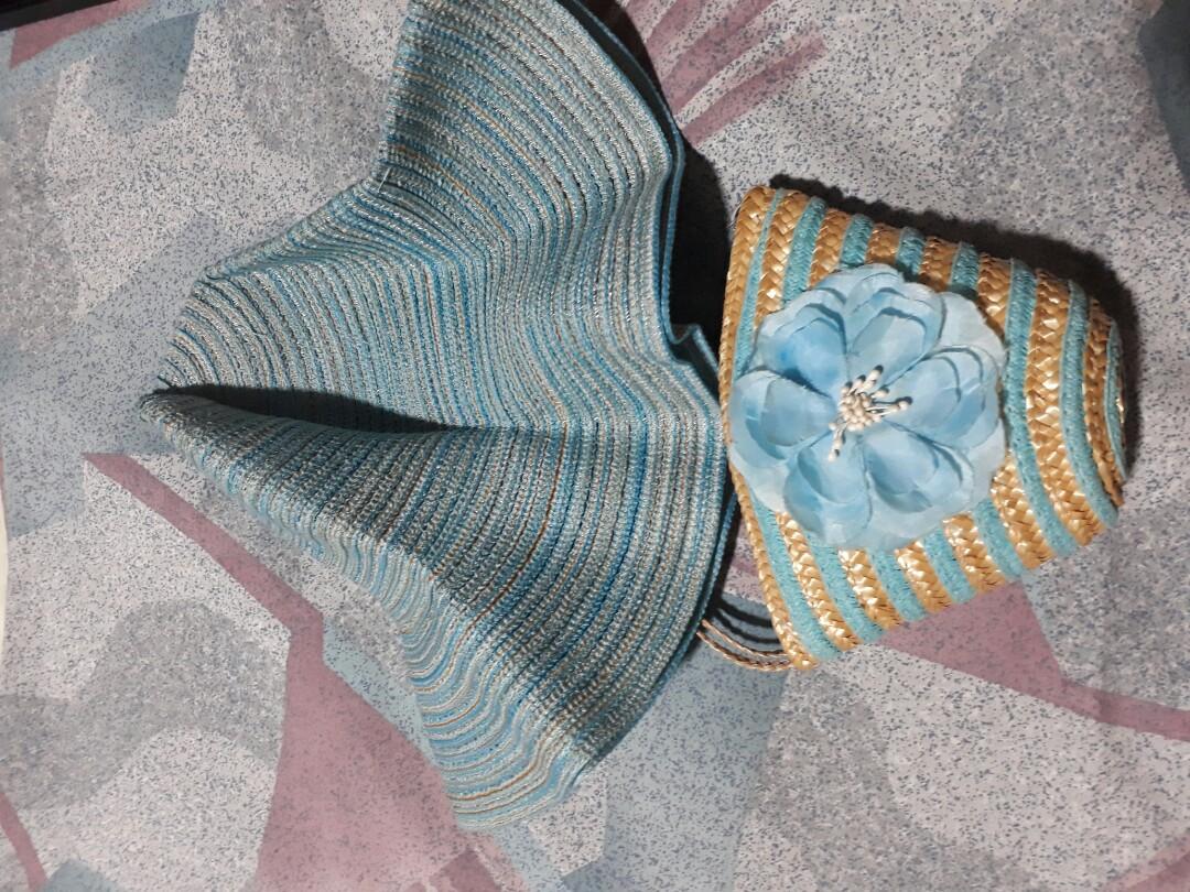 Hat in a purse (Category: Hats & Beanies) located in Quezon City. Submitted by declutteringusedbrandedstuff (Listing ID 1014981506, Image 2). Description: Slightly used cute special head dress. Payment thru BDO online transfer..