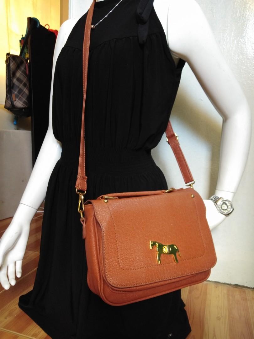 Soloist sling bag (Category: Cross-body Bags) located in Las Pinas. Submitted by arkco (Listing ID 1014940068, Image 1). Description: no flaws gcash cod lalamove or mcfa * there's a separate photo album for the complete details and photos of the bag. Paki browse na lang po. Salamat..