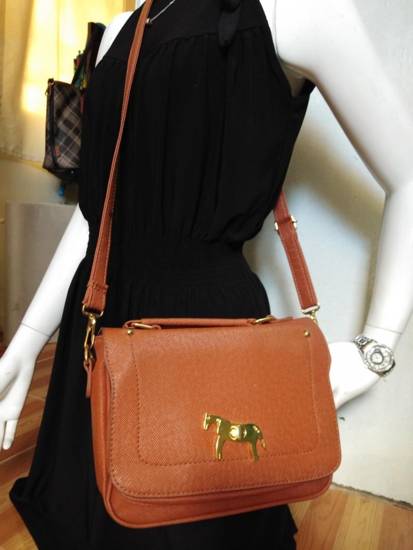 Soloist sling bag (Category: Cross-body Bags) located in Las Pinas. Submitted by arkco (Listing ID 1014940068, Image 2). Description: no flaws gcash cod lalamove or mcfa * there's a separate photo album for the complete details and photos of the bag. Paki browse na lang po. Salamat..