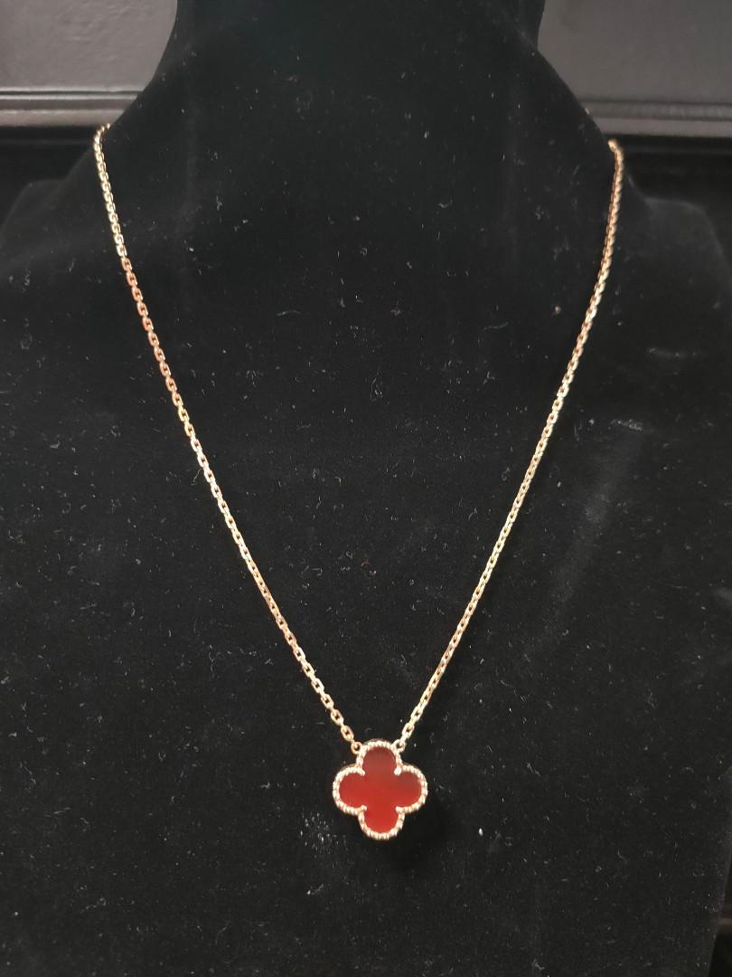 Sold at Auction: Van Cleef & Arpels Vintage Alhambra necklace, 10 motifs.  18k yellow gold, Carnelian.