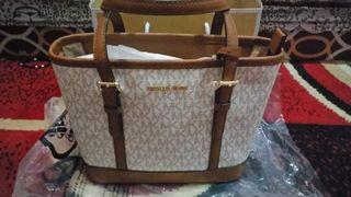 Authentic Michael kors tote in xs size