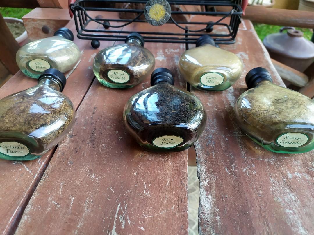 Dainty Condiment Bottles With Holder (Category: Spice & Seasoning) located in Davao. Submitted by papa1919 (Listing ID 1015271287, Image 3). Description: No longer safe for consumption due to long years. The contents of some bottles have shrunk in size due to age. I bought this from a collectibles store selling mostly vintage goods from the U.S. and this was almost 15 yrs ago. Hence, this now is only for decorative purposes..
