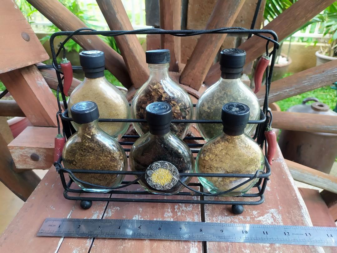 Dainty Condiment Bottles With Holder (Category: Spice & Seasoning) located in Davao. Submitted by papa1919 (Listing ID 1015271287, Image 2). Description: No longer safe for consumption due to long years. The contents of some bottles have shrunk in size due to age. I bought this from a collectibles store selling mostly vintage goods from the U.S. and this was almost 15 yrs ago. Hence, this now is only for decorative purposes..