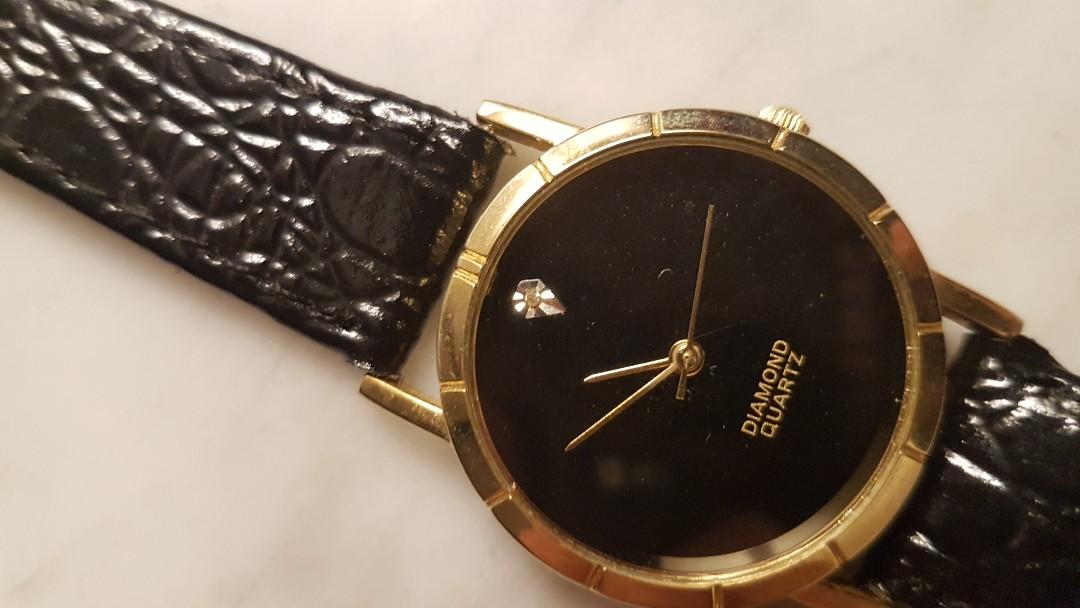 Genuine diamond sales quartz watch price