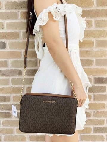 Mk jet set sling sales