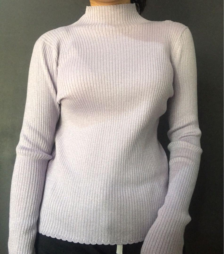 Uniqlo Sparkly Purple Turtleneck (Category: Blouses) located in Malabon City. Submitted by swiftiesource (Listing ID 1015147554, Image 2). Description: Selling this sparkly purple turtleneck from Uniqlo! Brand new with tag, perfect for a gift! Reason for sale: not my style :( color true to pic 3&4!.