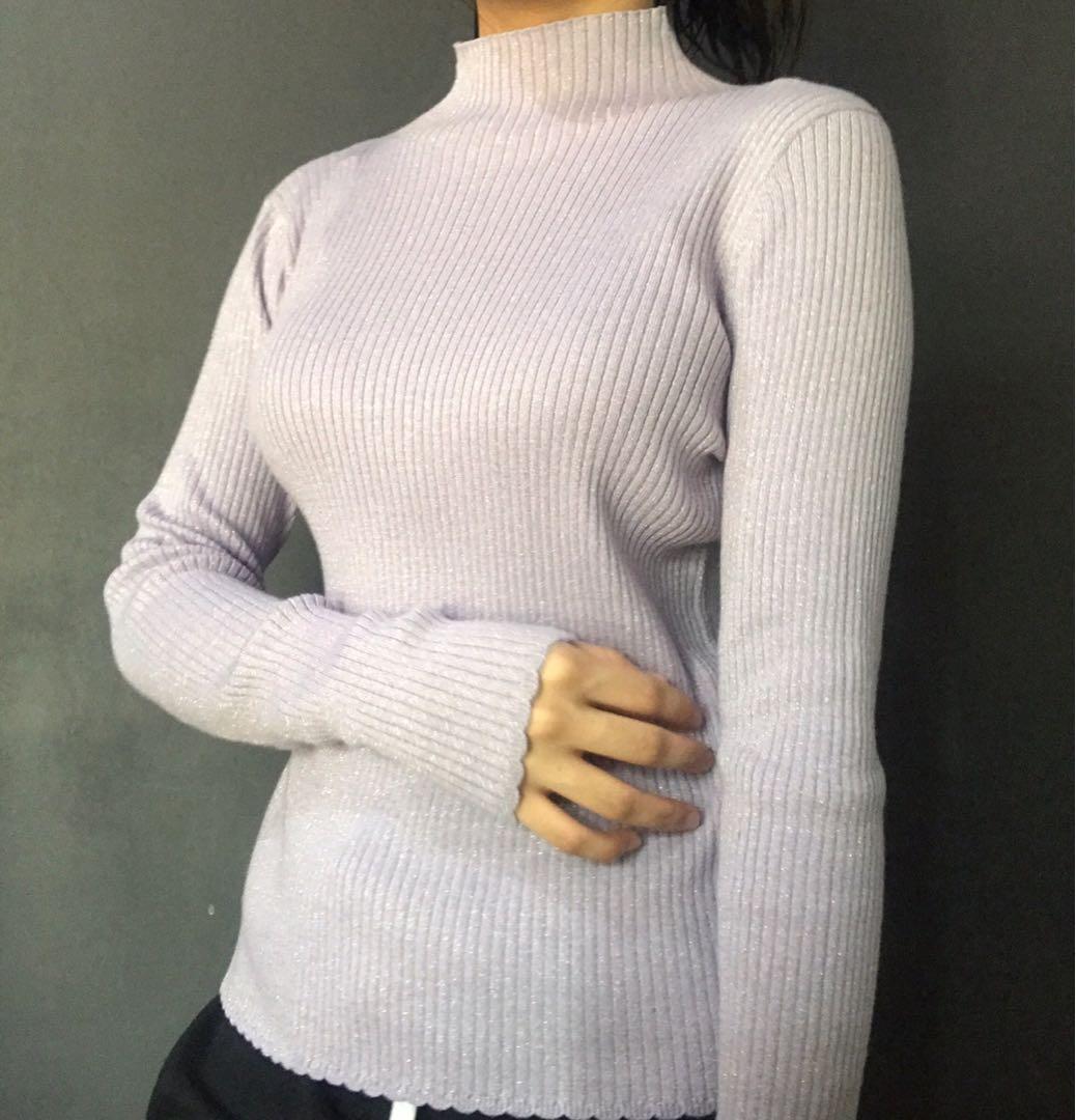 Uniqlo Sparkly Purple Turtleneck (Category: Blouses) located in Malabon City. Submitted by swiftiesource (Listing ID 1015147554, Image 1). Description: Selling this sparkly purple turtleneck from Uniqlo! Brand new with tag, perfect for a gift! Reason for sale: not my style :( color true to pic 3&4!.
