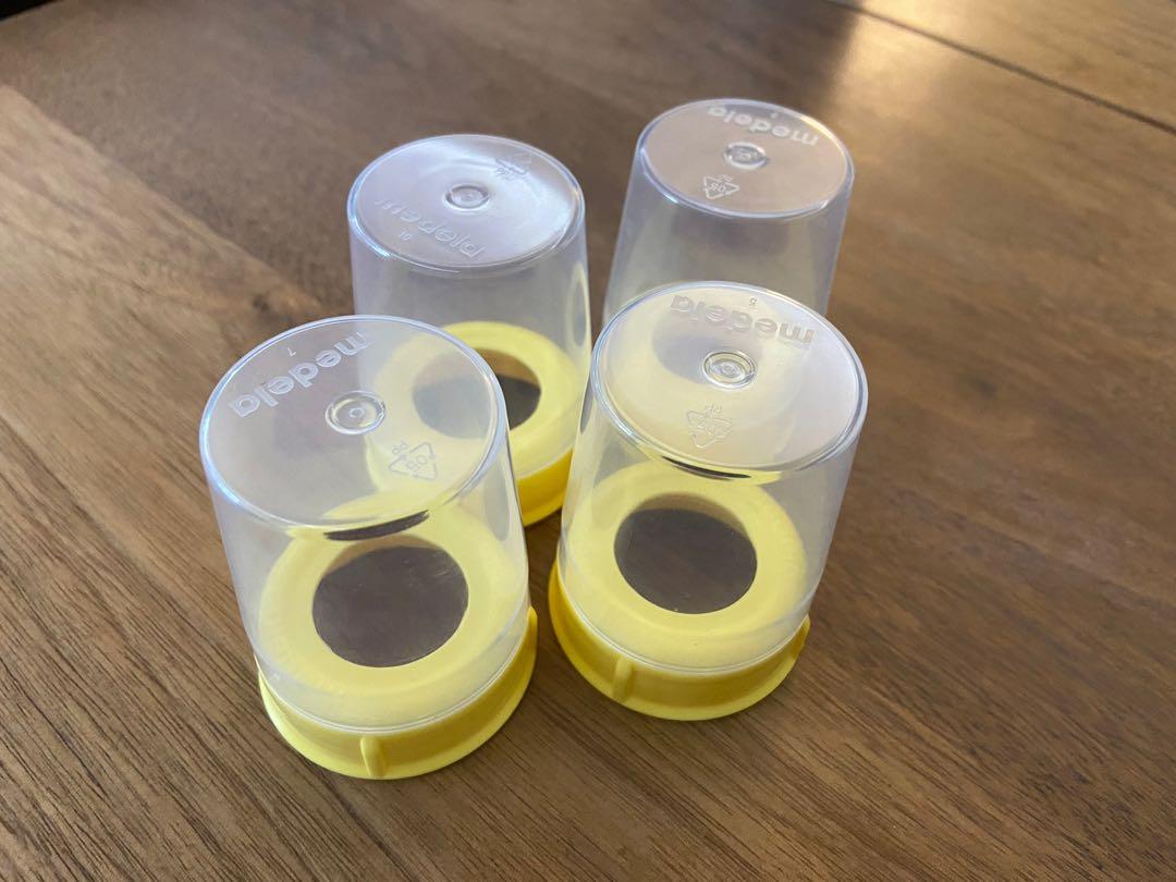 4 New Medela narrow base collars with clear bottle caps