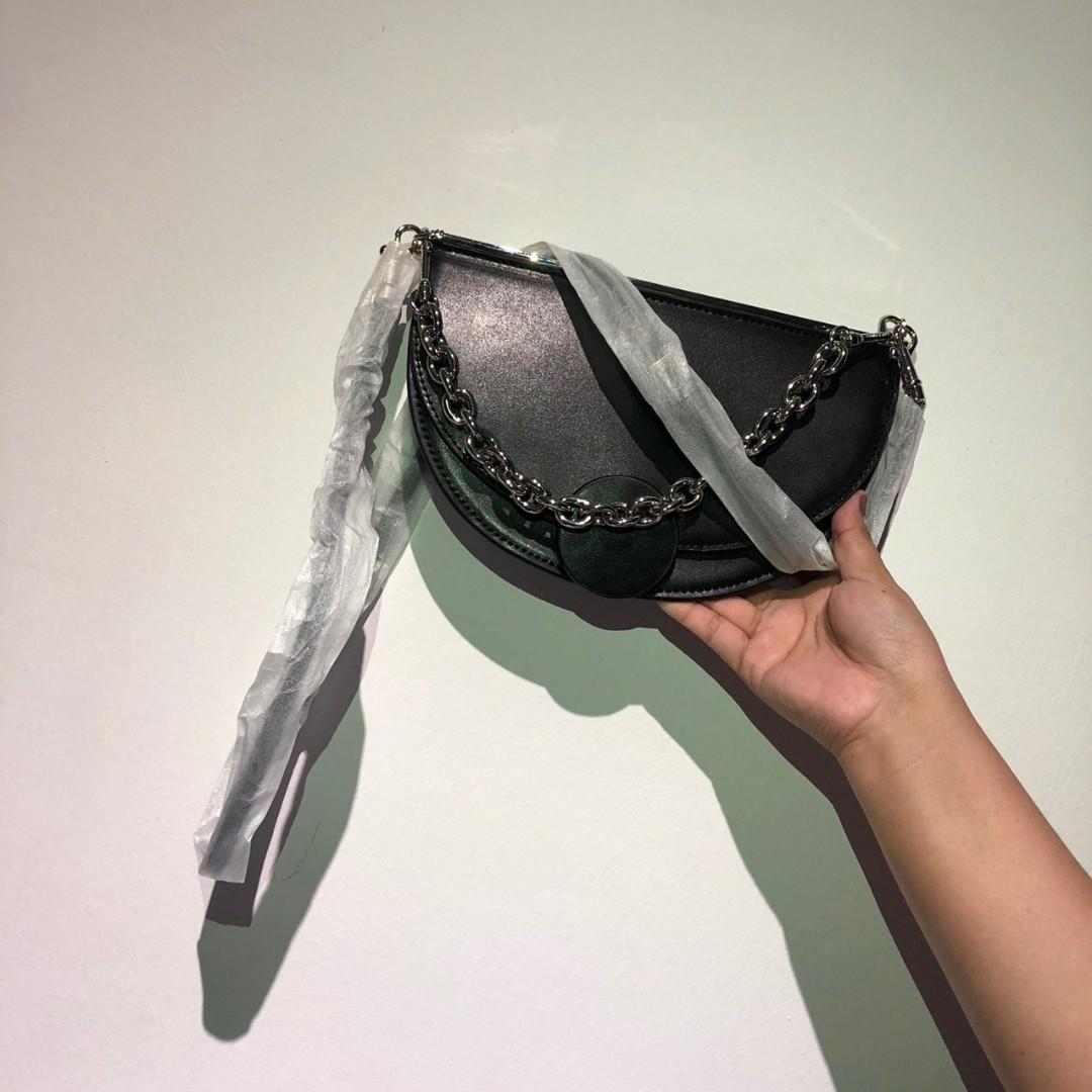 Charles and keith half moon clutch cheap