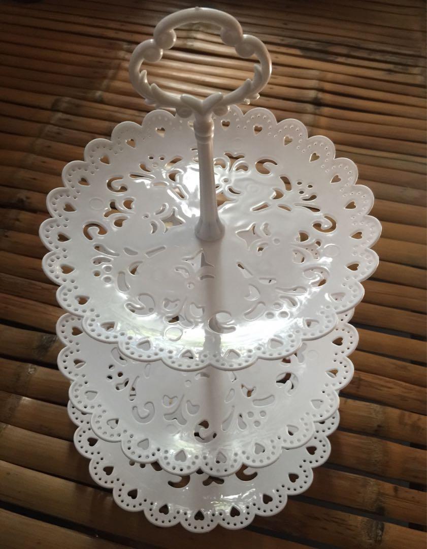 Cupcake/minicake stand (Category: Bakeware) located in Pasay City. Submitted by jejuvan (Listing ID 1015382619, Image 1). Description: Good for all occasions, very presentable and elegant style in your table. Layered Round 3 tier can adjust 2tier and can use as a single plate. Made of plastic. Ideally cupcake, minicake, sweets, macaroons, fruits and etc. Buy2 for 600php #cakestand #cupcakestand #oven #baking #kitchen #pasay #manila #partyneeds #s