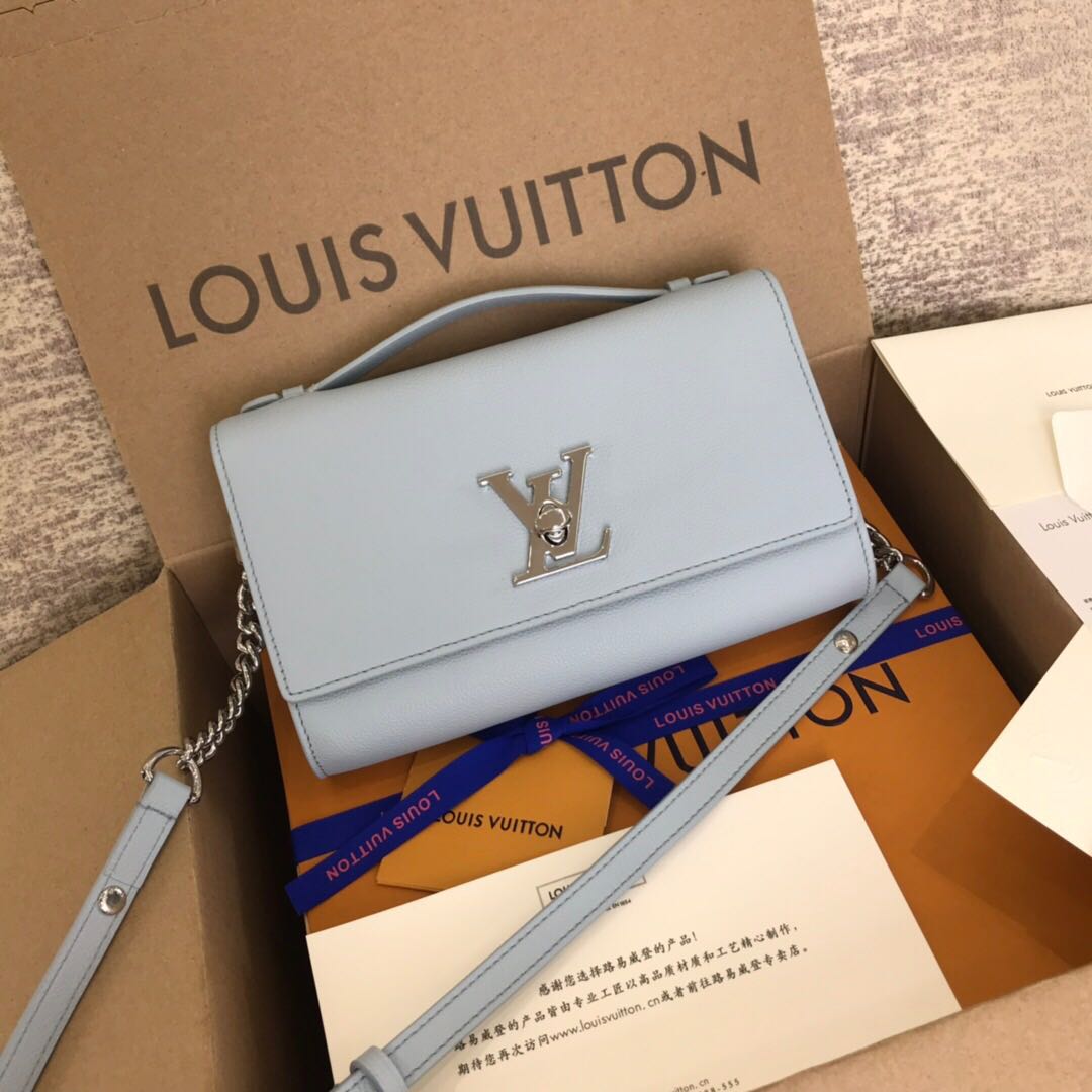 Louis Vuitton Lockme Clutch in Blue