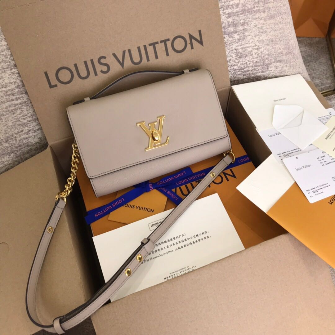 LV Lockme clutch, Women's Fashion, Bags & Wallets, Purses & Pouches on  Carousell