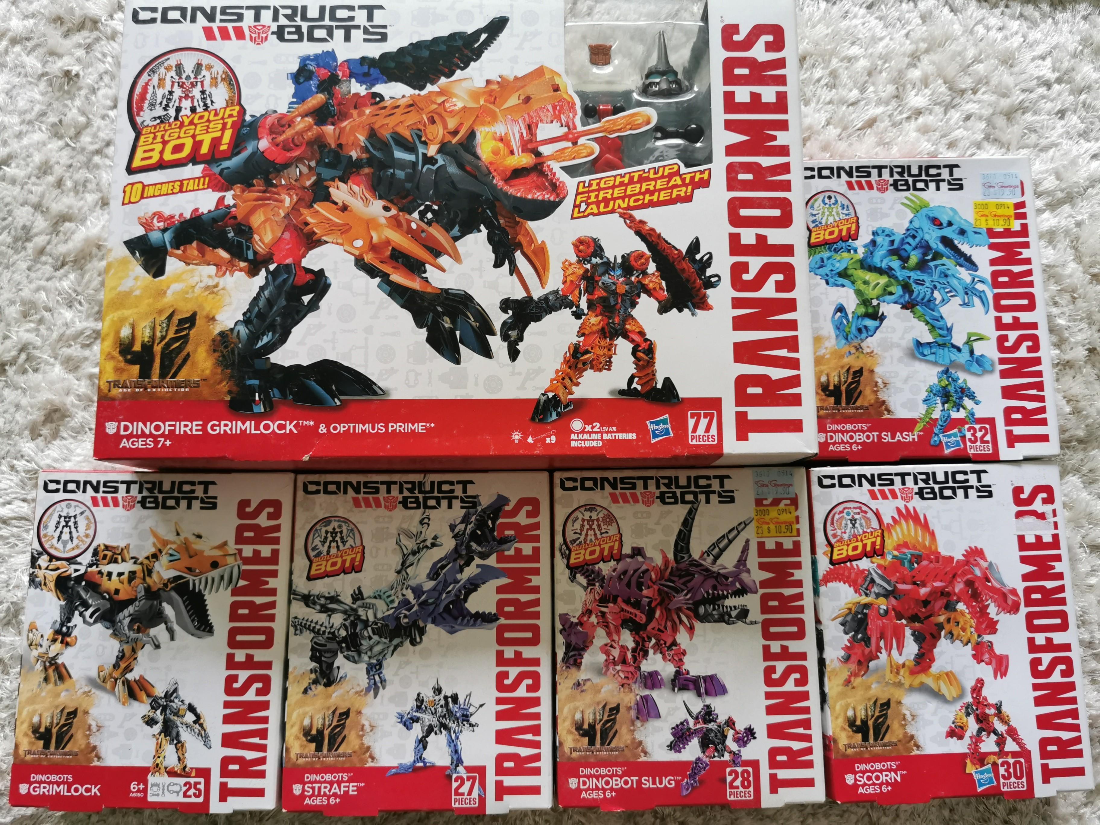 Transformers Contructbots Dino Sets (Category: Gundam Model Kits) located in Singapore. Submitted by zoidspoison13 (Listing ID 1015322965, Image 1). Description: Brand new in sealed boxes. The complete set of 5 Dinobots and the special Optimus Prime riding on Grimlock..
