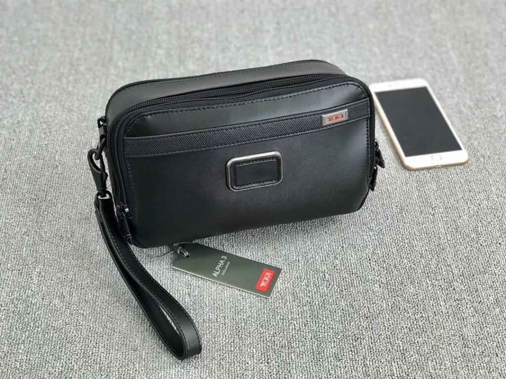 Clutch bag best sale tumi