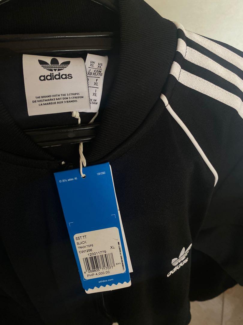 Adidas Originals SST Jacket (Category: Hoodies) located in Marikina City. Submitted by paultee2 (Listing ID 1015564827, Image 2). Description: Brand new with tag. 10/10 condition🔥 NEW NEW NEW.