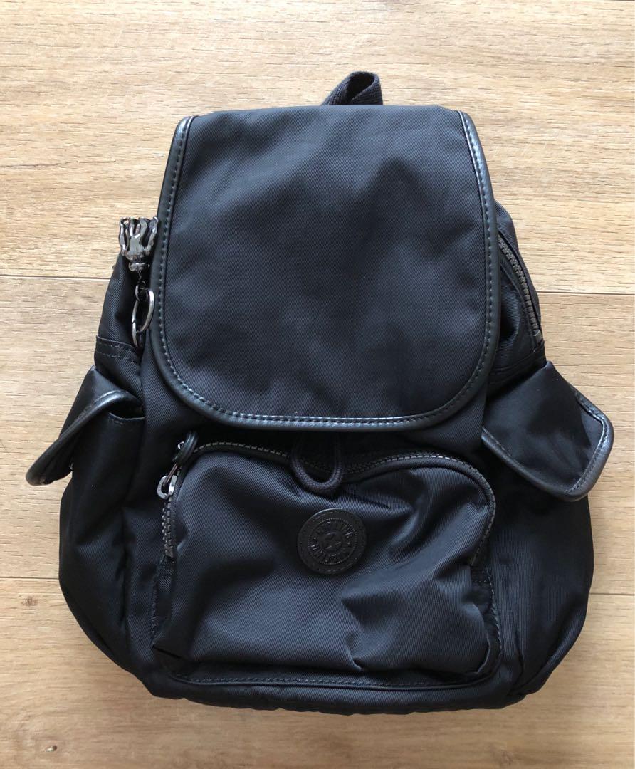 Black Backpack (Category: Backpacks) located in Singapore. Submitted by kateelim8 (Listing ID 1015582525, Image 1). Description: Purchased on impulse at $160. Used 3 times in total. Condition is good, lightweight and waterproof..