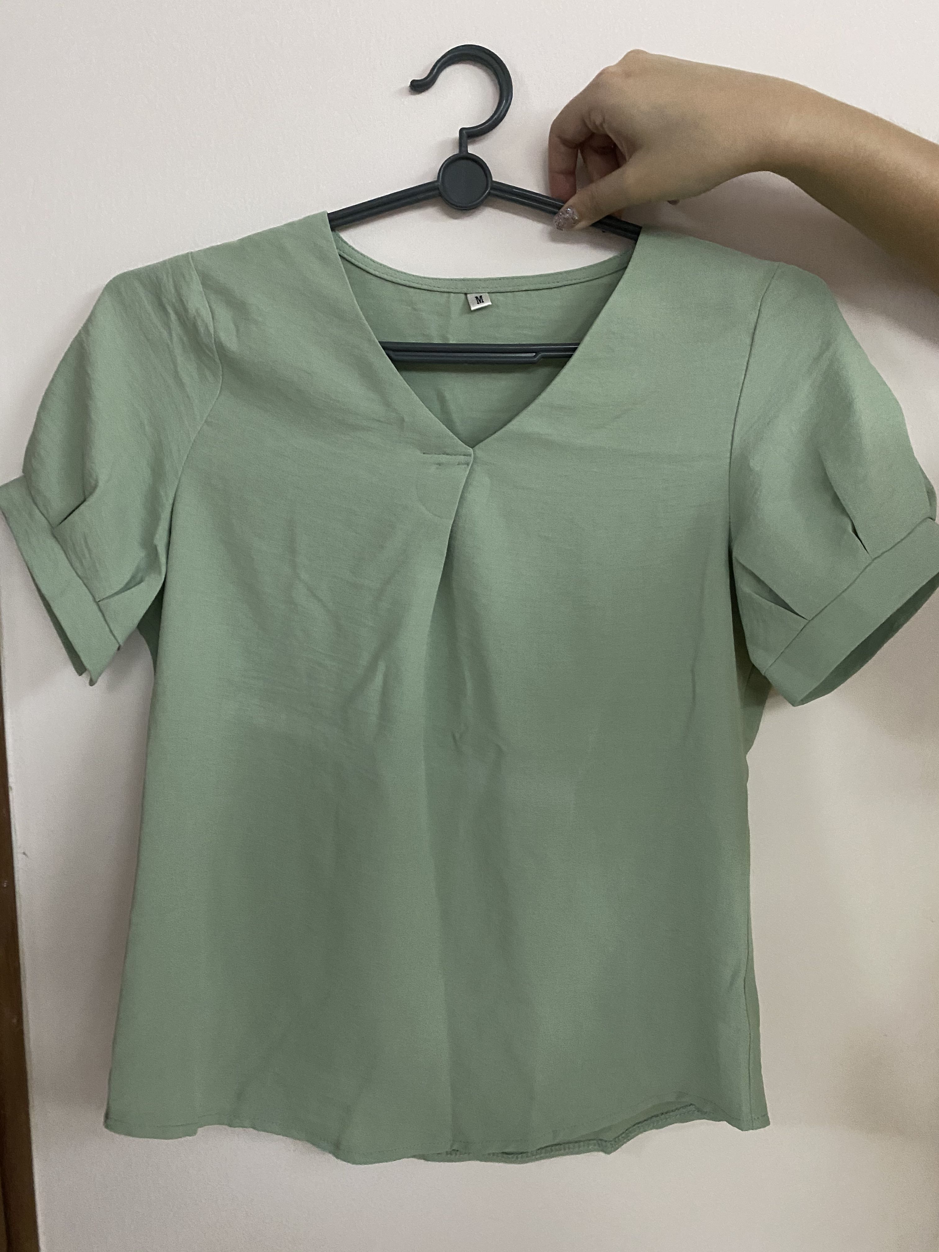 mint green blouse
