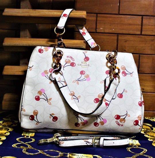 cherry coach purse