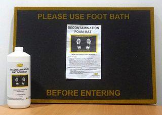 DECONTAMINATION MAT WITH SOLUTION