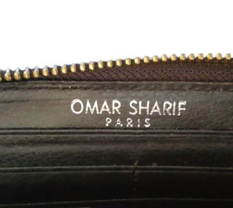 Omar Sharif Wallet (Category: Luxury Bags & Wallets) located in Quezon City. Submitted by msiscloset (Listing ID 1015542658, Image 2). Description: Zip around closure Deep purple/violet patent leather With multiple card slots With bills compartment With zip closure compartment for coins #purplewallet #violetwallet #ziparoundwallet #longwallet #zipperwallet #patentwallet .