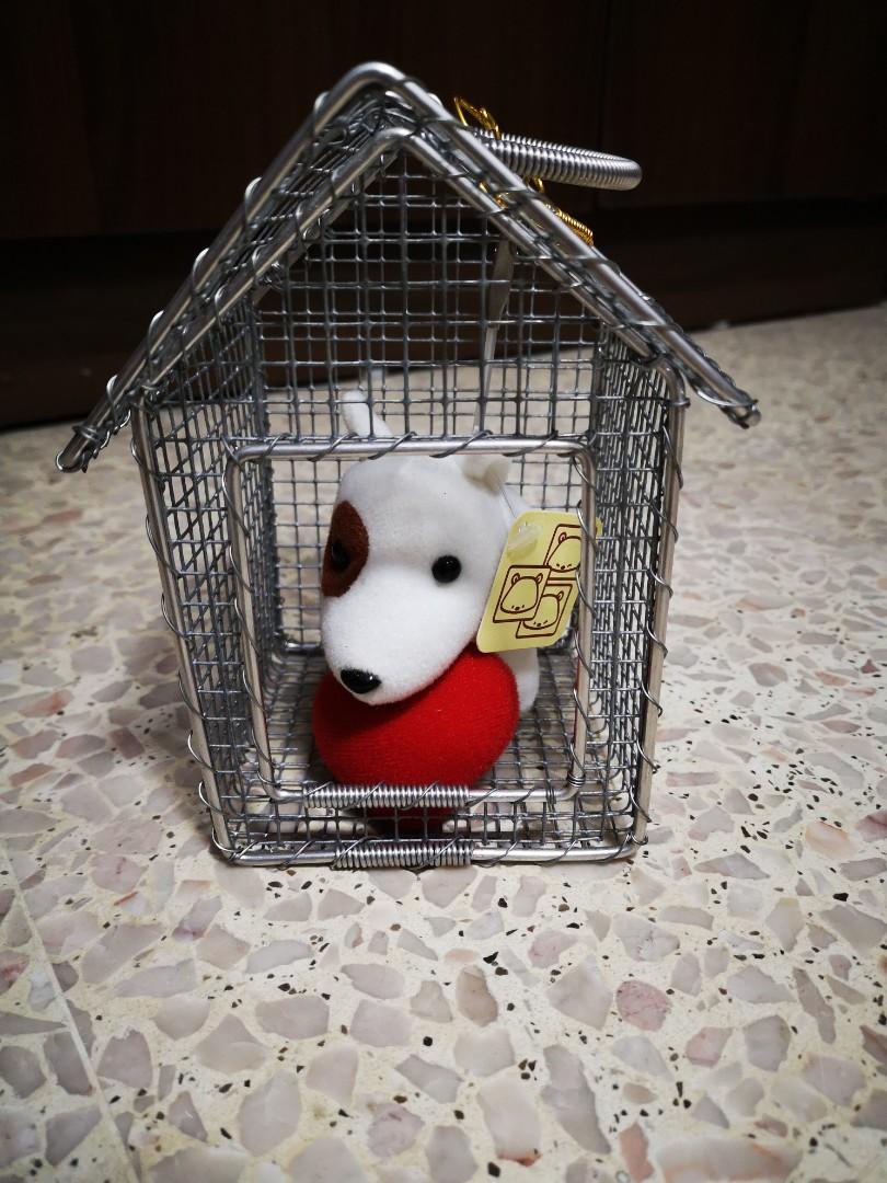 dog in a cage toy