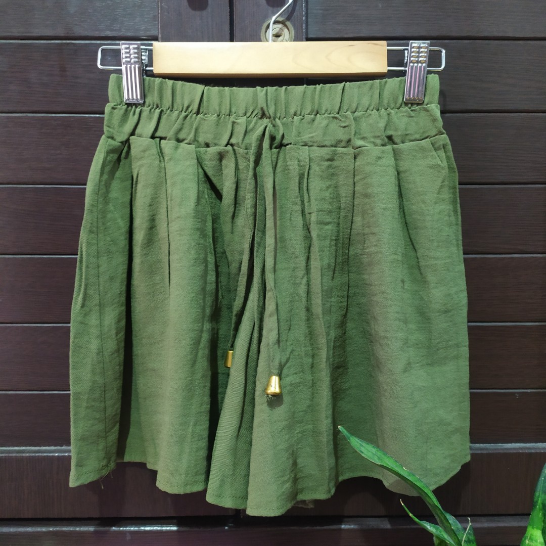 green flowy shorts