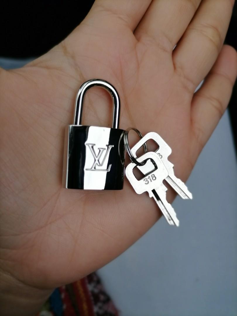 Authentic LV Silver Padlock with keys. Taken from LV Alma BB that