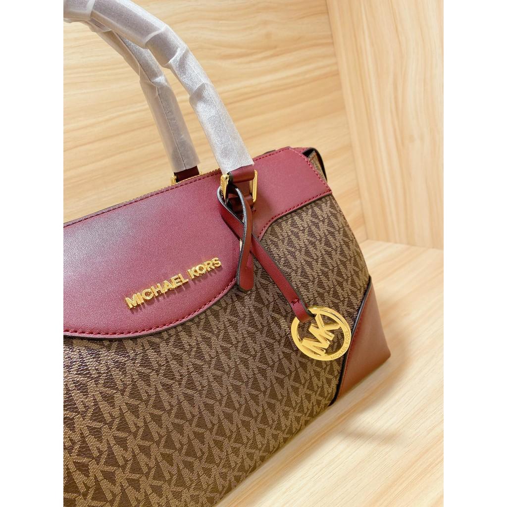 michael kors round sling bag