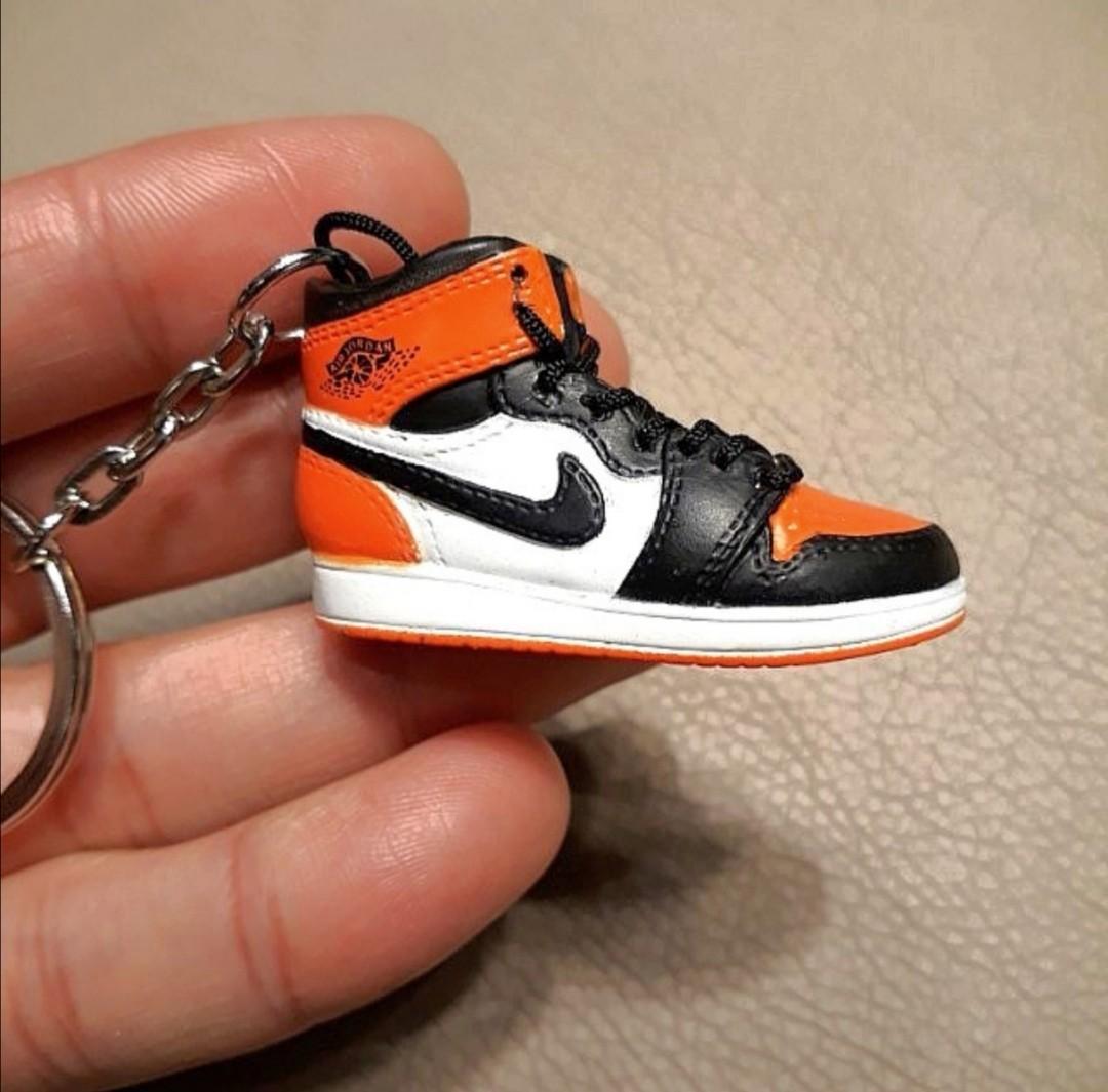 Orange store nike keychain