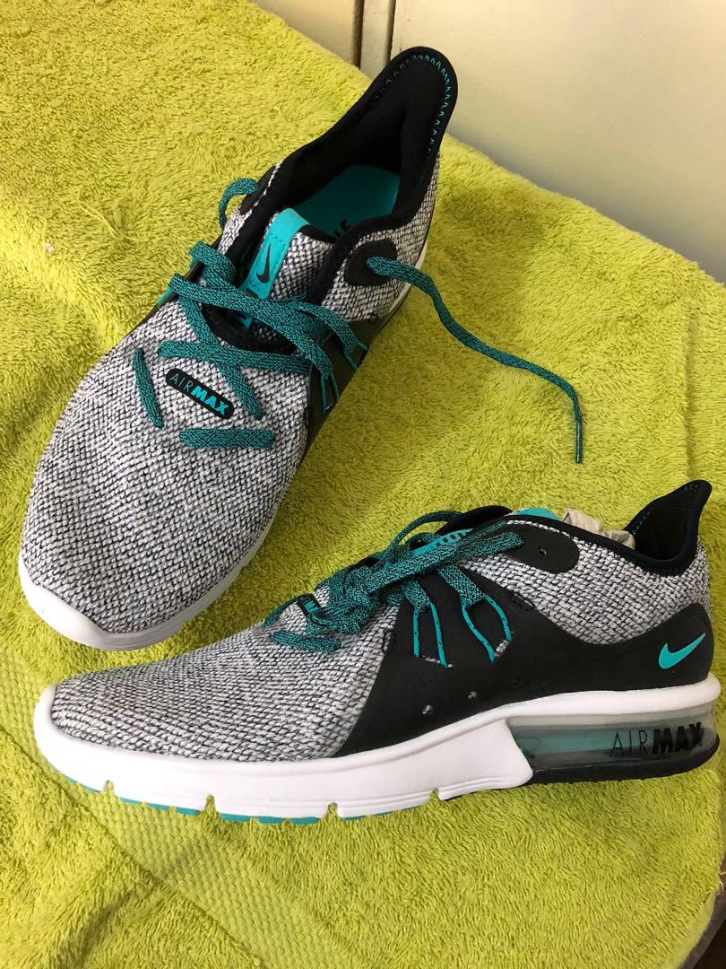 green and black nike shoes
