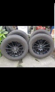 Swallow mags 16x6.5 with 215-60-16 tires