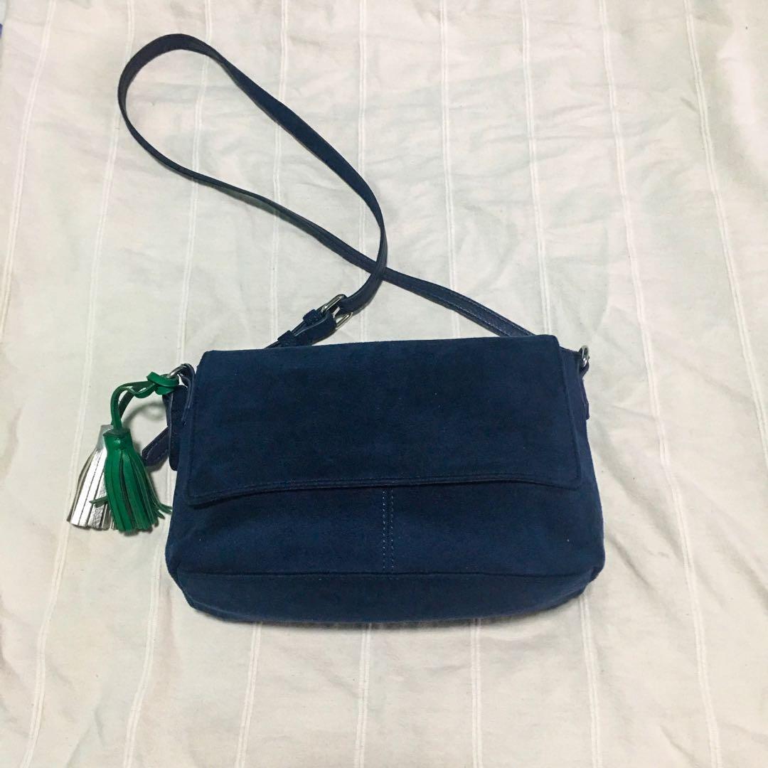 Old navy blue sling bag
